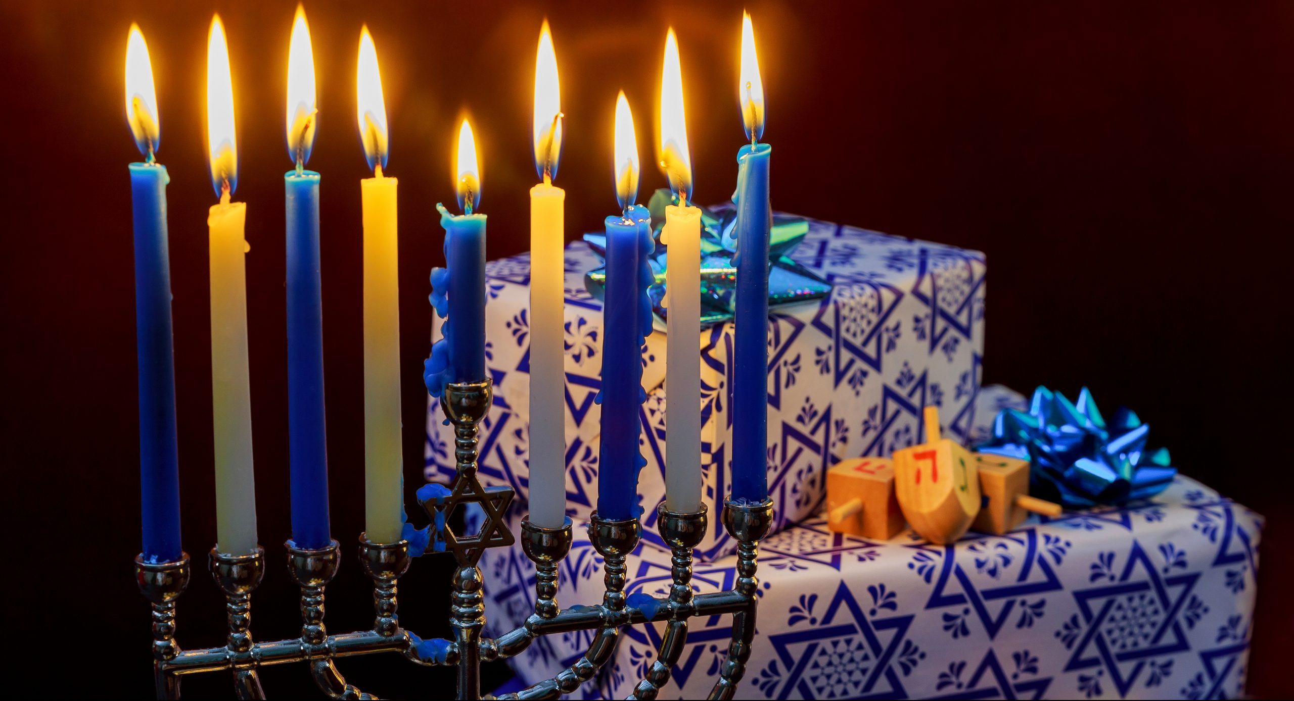 Jewish Holiday Hanukkah holiday with menorah burning candles.